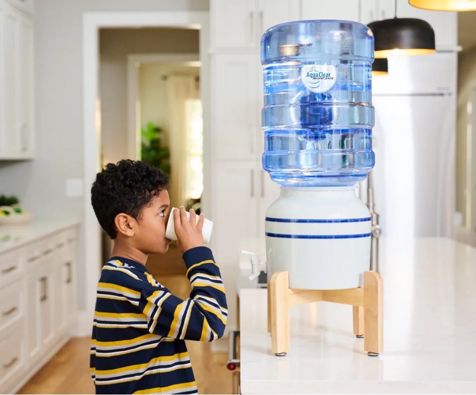 Family enjoying fresh AquaClear bottled water at home in Northeast Ohio